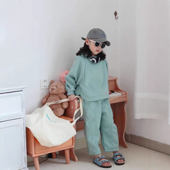 2025子供の新しい子供服の気質の宝物のカジュアルなゆったりした色のファッションの2つのセットの子供のスーツのins風