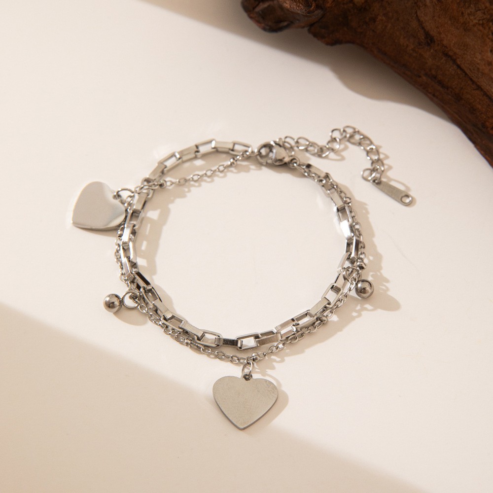 En stock, la correa de acero de titanio explosiva colección de verano no se desvanece, mujeres sencillas y sofisticadas, estilo transfronterizo europeo y americano.