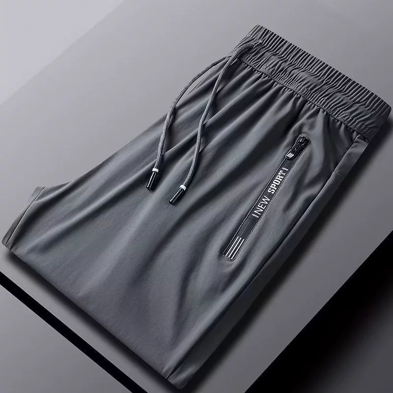 Сезонные брюки мужские свободные дикие повседневные брюки мужские эластичные повседневные спортивные штаны тенденции плюс размер прямые брюки