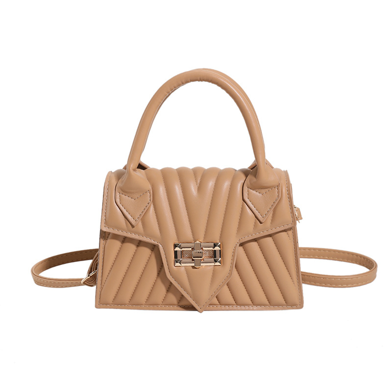 Textura 2025 nueva moda de impresión de estilo extranjero rotary-lock mochila de hombro casual color caramelo bolso de mano de mujer