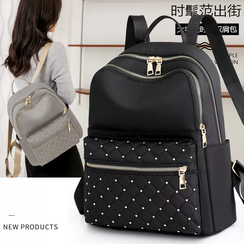 2022跨境外贸新款菱格绣线铆钉双肩包女韩版百搭大容量商务通勤包