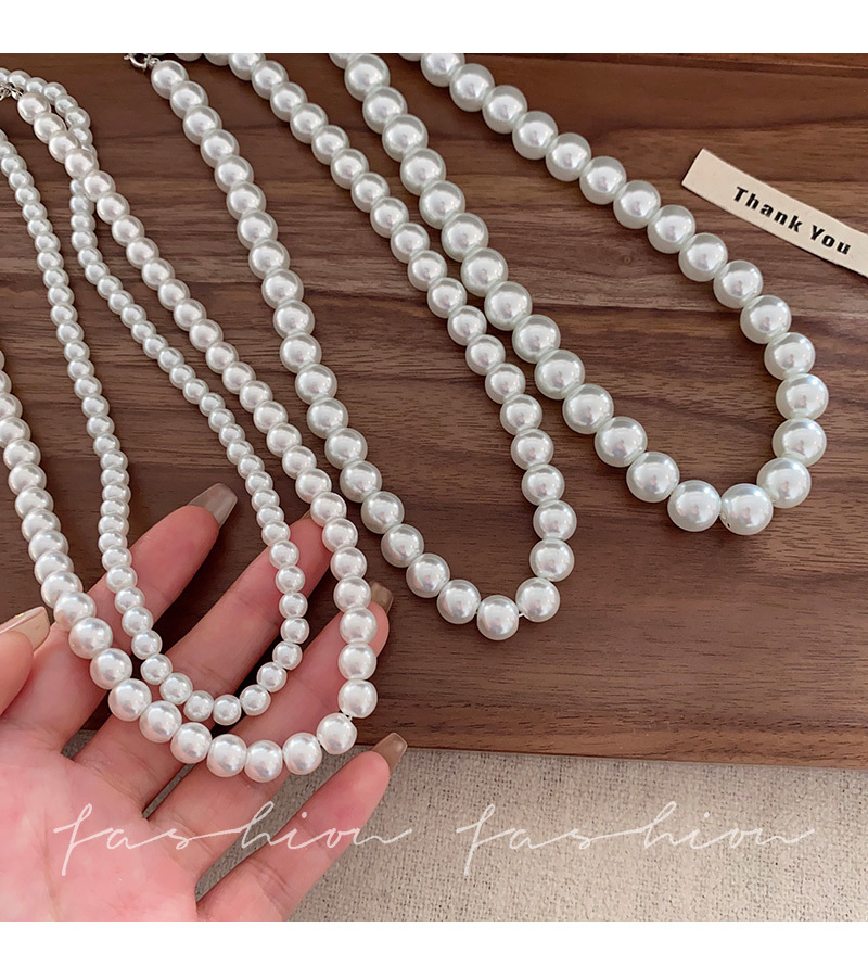 Collana lunga con perle di vetro stile francese elegante vintage_voghion.com