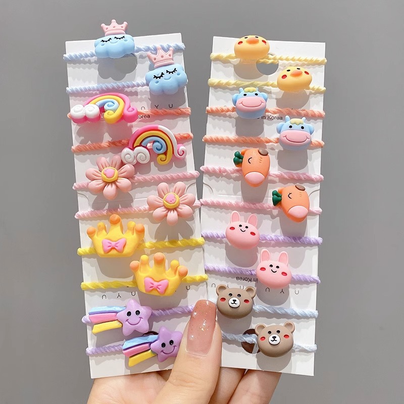 La cuerda del pelo del bebé de las muchachas de la banda de goma de los niños no lastima el pelo Los accesorios del pelo del pulgar del tamaño pequeño atan la banda de goma del pelo