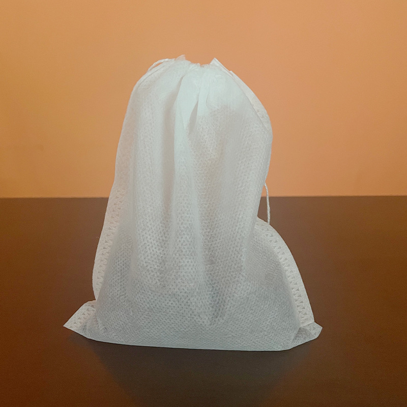 Especificaciones completas Tela no tejida desechable termosellado 100 piezas Bolsa de filtro termosellado Bolsa de bolsa de té Bolsa de decocción Bolsa de baño de pies