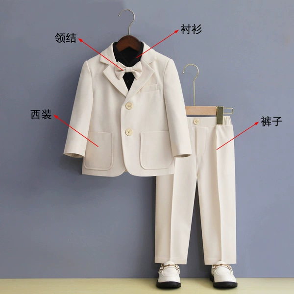 White suit, trousers, black shirt, bow tie