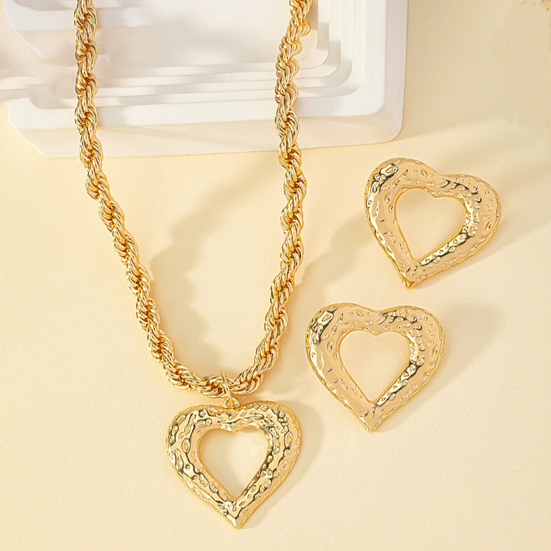 Simple Style Heart Shape Alloy Hollow Out Women's Earrings Necklace display picture 1