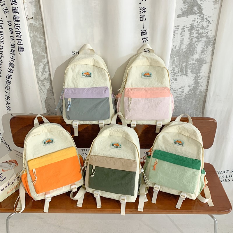 Jardín de infantes bolsas escolares de moda de color contraste de gran capacidad mochila para niños y niñas 2025 otoño y invierno nueva bolsa para niños