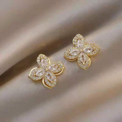 Rotating four-leaf flower earrings  Internet celebrity fashion temperament women's earrings exquisite versatile personalized earrings
