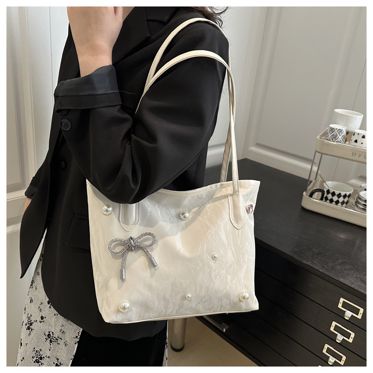 Casual work commuting bag for women, large capacity, new Spring 2025, stylish and simple single-shoulder shopping bag tote bag undefined