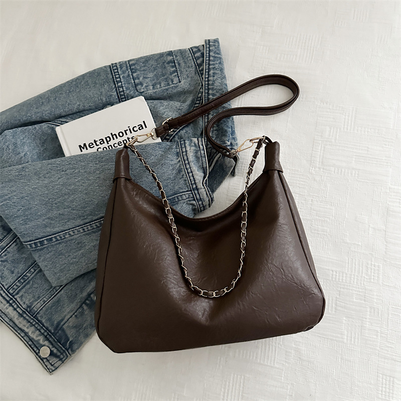 2024 bolso de estudiantes coreano para mujeres de gran capacidad nicho versátil bolso de hombro de alto nivel bolso de cubo de cadena