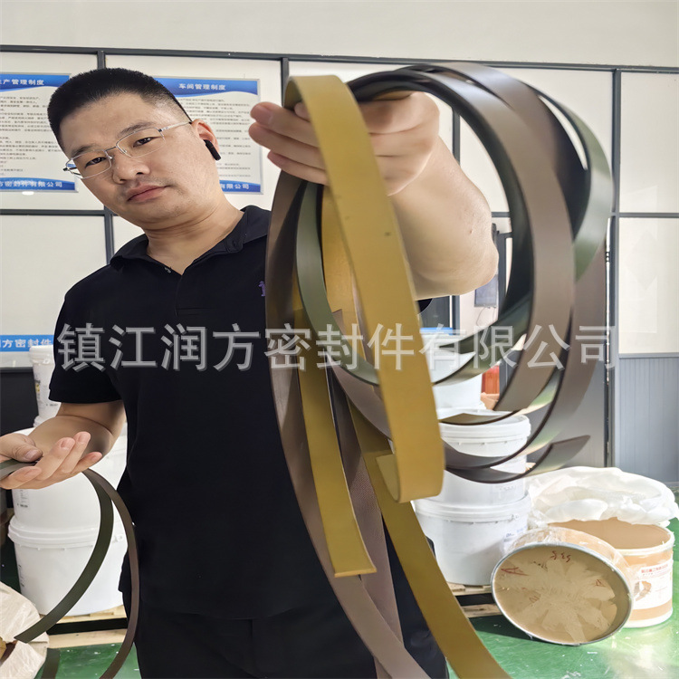 供应高铜粉聚四氟乙烯导向带  四氟663锡青铜粉增强带 耐磨带 条