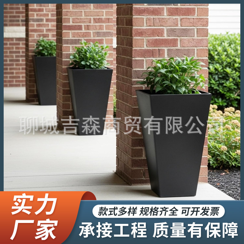 Large black planter box for growing green plants, outdoor garden, patio, metal flower pot, villa entrance landscaping flower pot