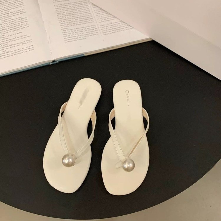 Zapatillas francesas de zapatillas de mujer 2026 nuevas sandalias de playa de perlas de verano