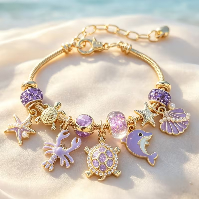 Ocean-themed Pandora-style beaded bracelet with dolphin, turtle, starfish, and shell pendants, gold snake bone bracelet, summer gift for girls Ocean-themed Pandora-style beaded bracelet with dolphin, turtle, starfish, and shell pendants, gold snake bone bracelet, summer gift for girls