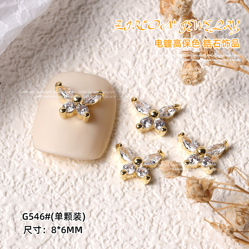 Nueva luz de la celebridad Internet lujo circón Super Flash Perla Cadena amor mariposa colgante uñas Oro Cielo Estrellado Estrella Diamantes