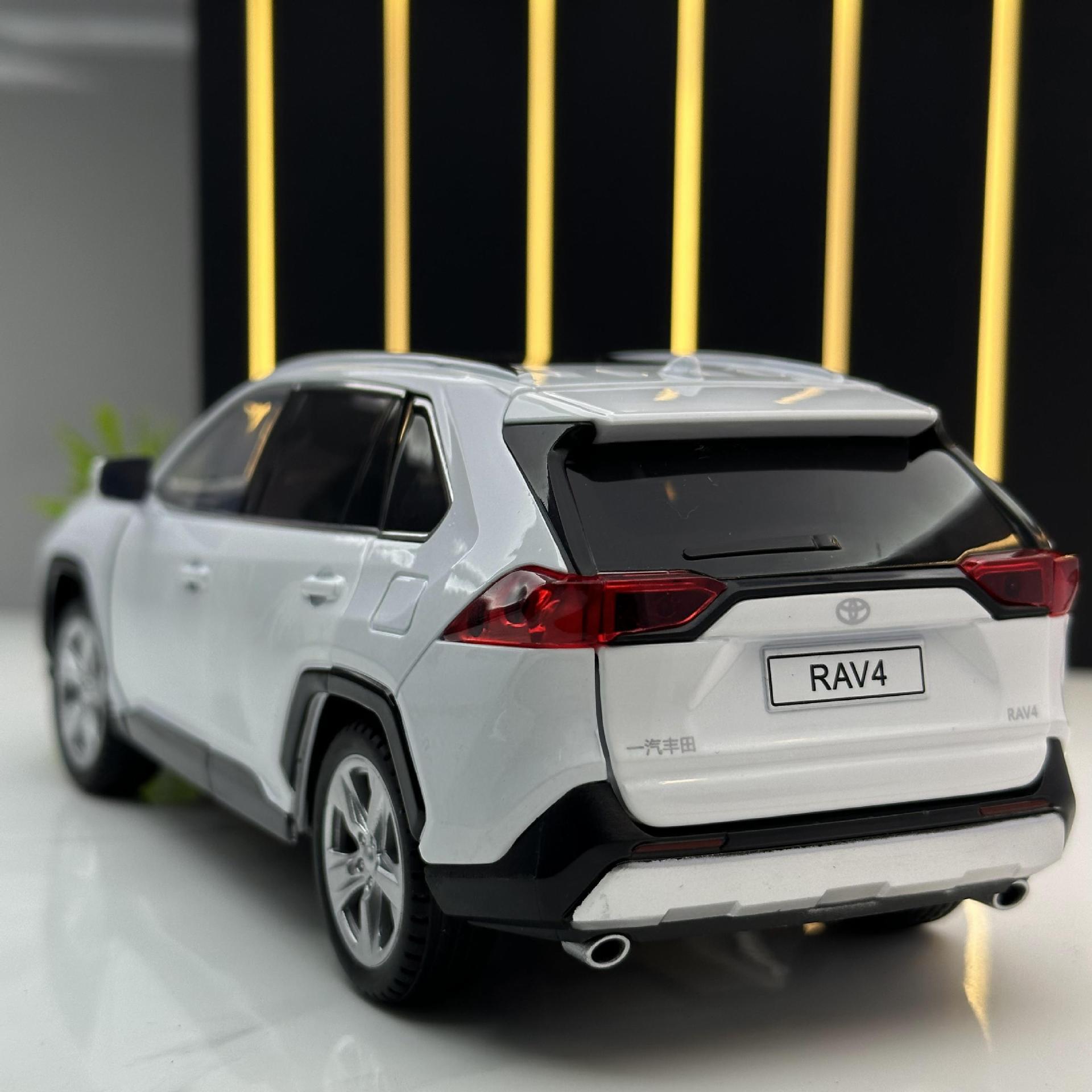Zhiguan aleación modelo de coche 1:24 genuino Toyota RAV4 Rong Puerta Abierta sonido y luz Tire hacia atrás juguete vehículo todoterreno modelo péndulo