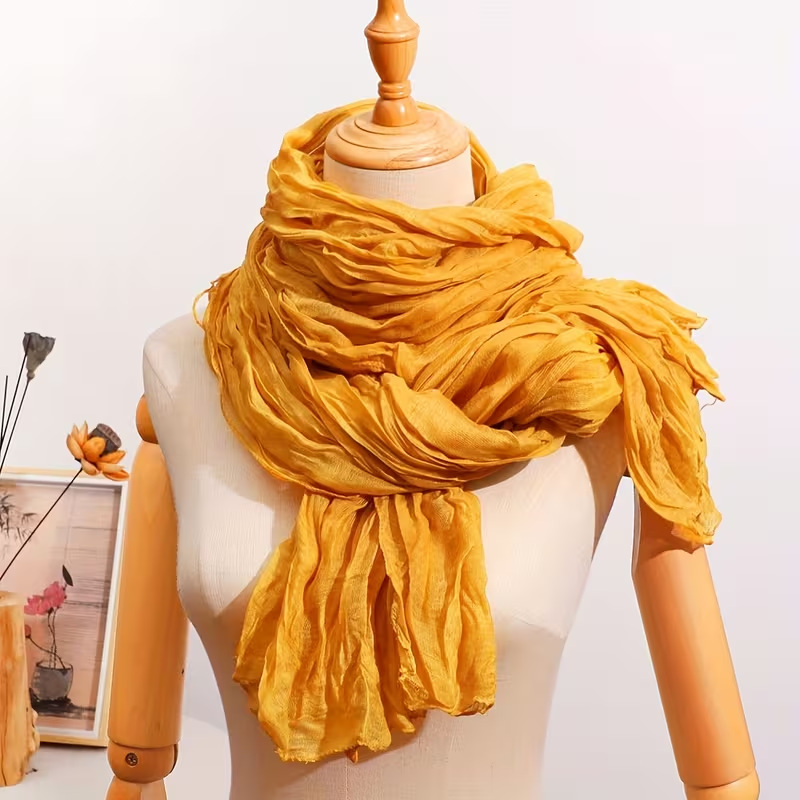 Korean-style new vintage artistic pleated cotton-linen solid color twisted scarf for women, suitable for spring and autumn, with a Bali gauze outer layer as a shawl