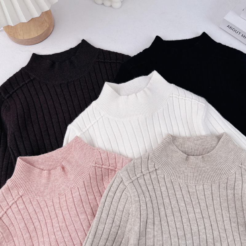 Suéter para niñas 2025 principios de otoño nuevo estilo blusa de bebé camisa de fondo invierno cálido suéter de punto para niños de cuello medio alto