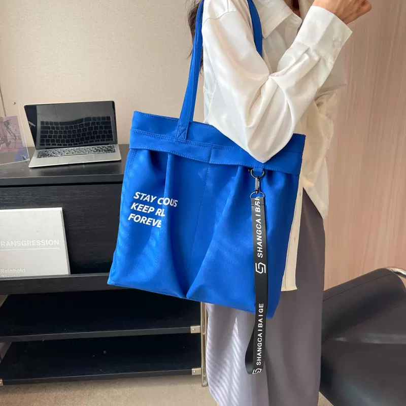 帆布包包女大容量2025新款简约质感单肩包百搭褶皱学生上课托特包