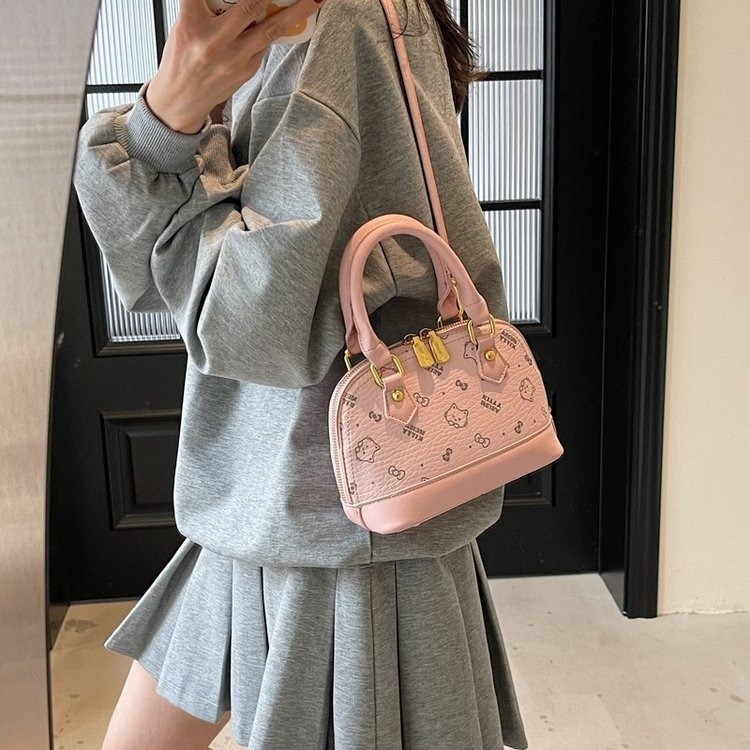 Bolso de mochila para mujeres 2025 textura fresca de alta calidad felina de moda versátil bolso coreano de viaje bolso de hombro