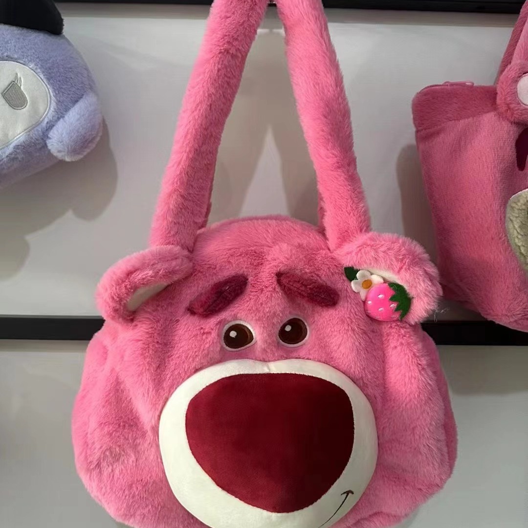 Venta al por mayor nuevo juguete de peluche fresa oso ardilla grande Satchel transfronterizo Comercio exterior muñeca bolsa grab máquina intercambio regalo