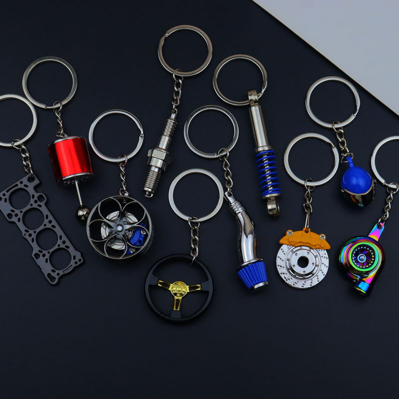 Spot Car Modification Metal Accessories Gasket Spark Plug Brake Steering Wheel Turbine Helmet Shock Absorber Key Pendant Spot Car Modification Metal Accessories Gasket Spark Plug Brake Steering Wheel Turbine Helmet Shock Absorber Key Pendant