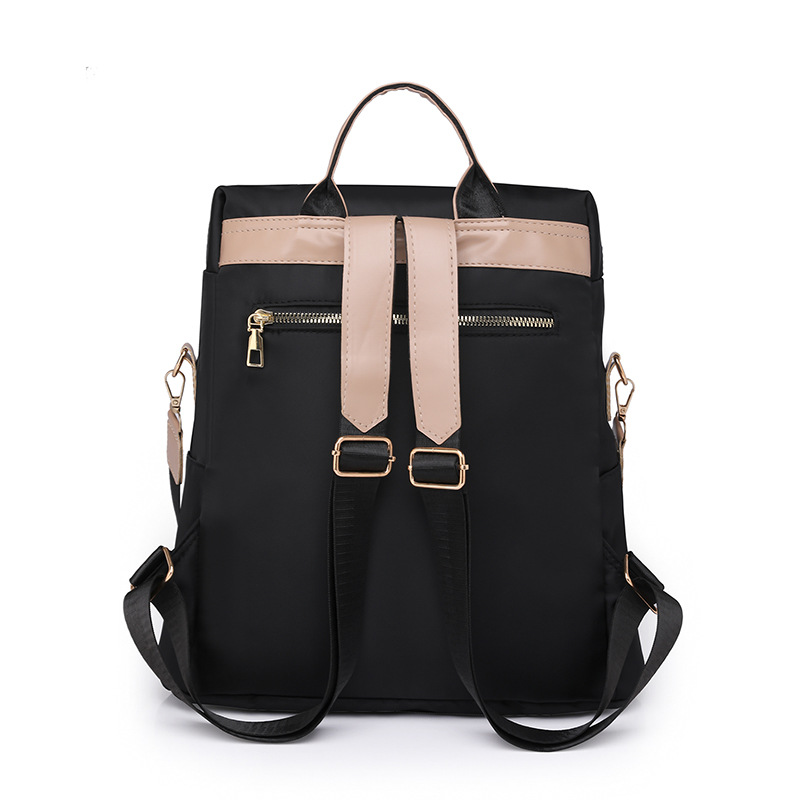 2023 nueva mochila casual para mujer nylon color contraste moda borla mochila de viaje multifuncional de doble uso al por mayor