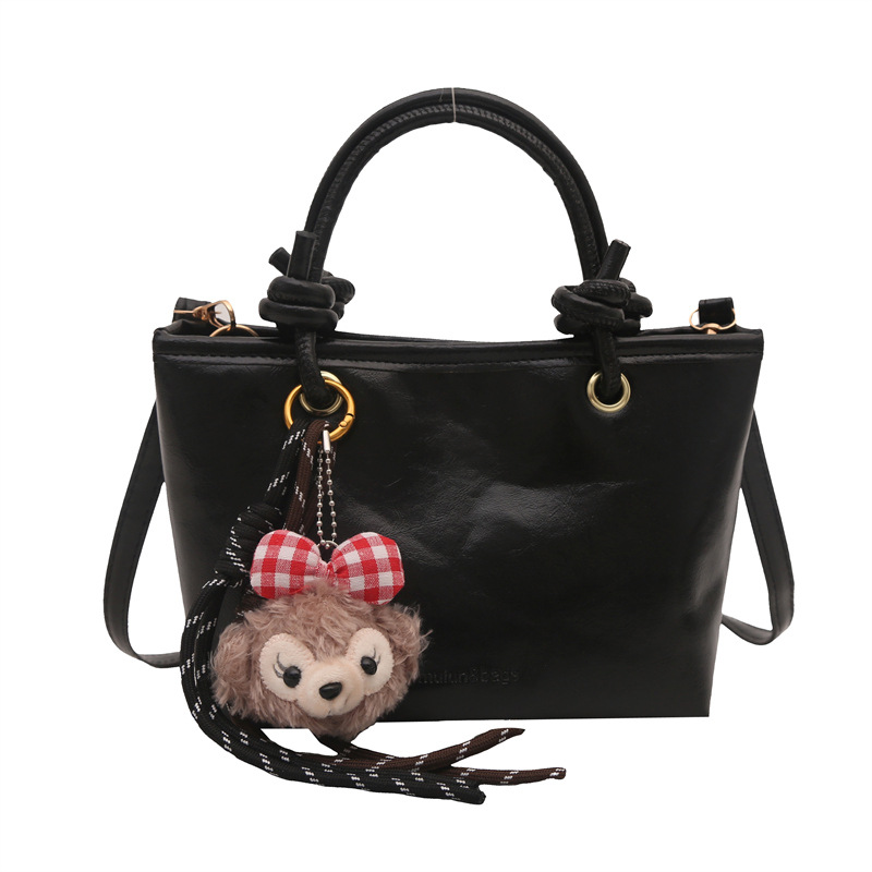 Este año, bolsos populares populares de invierno para mujeres, versátiles, 2024 nueva moda, bolsos portátiles, bolsos de cubo