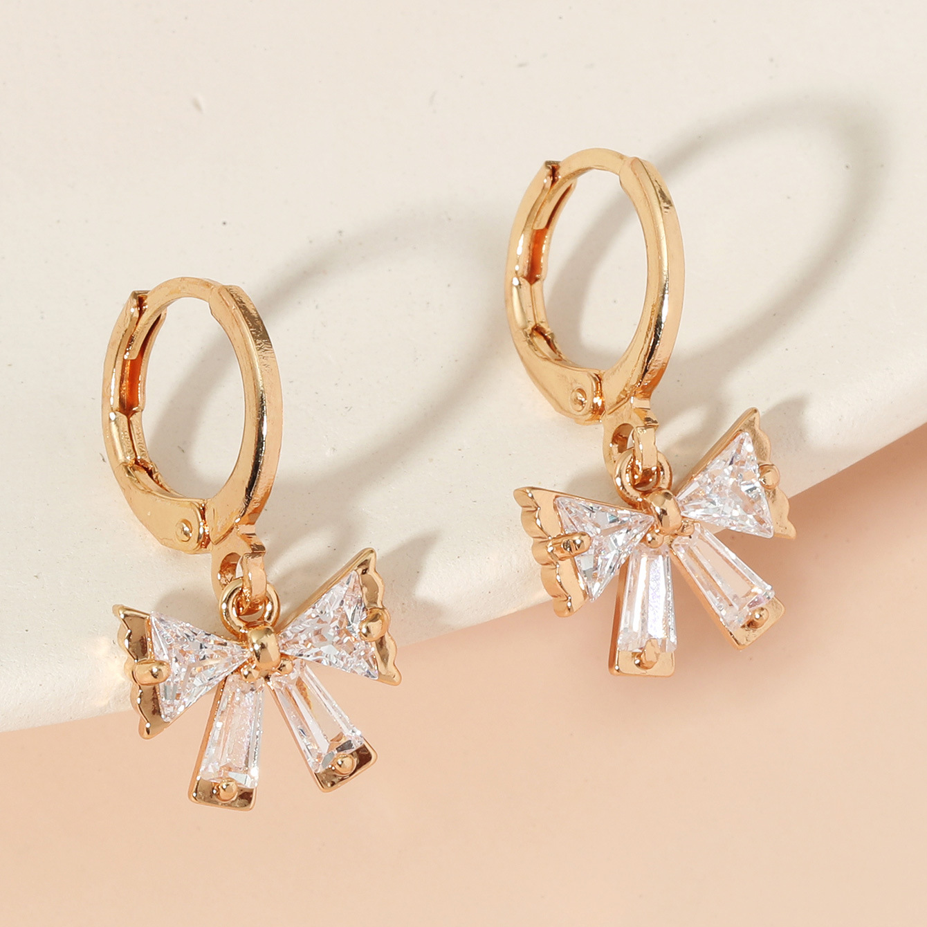 Korean Retro Bow Zircon Copper Earrings Wholesale Nihaojewelry display picture 4