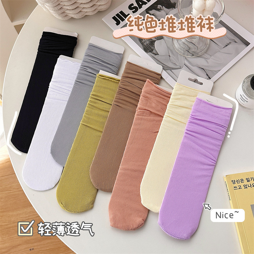 Calcetines de hielo calcetines de terciopelo de primavera y verano para mujer medias de media pantorrilla calcetines de JK largos blancos puros calcetines de moda al por mayor