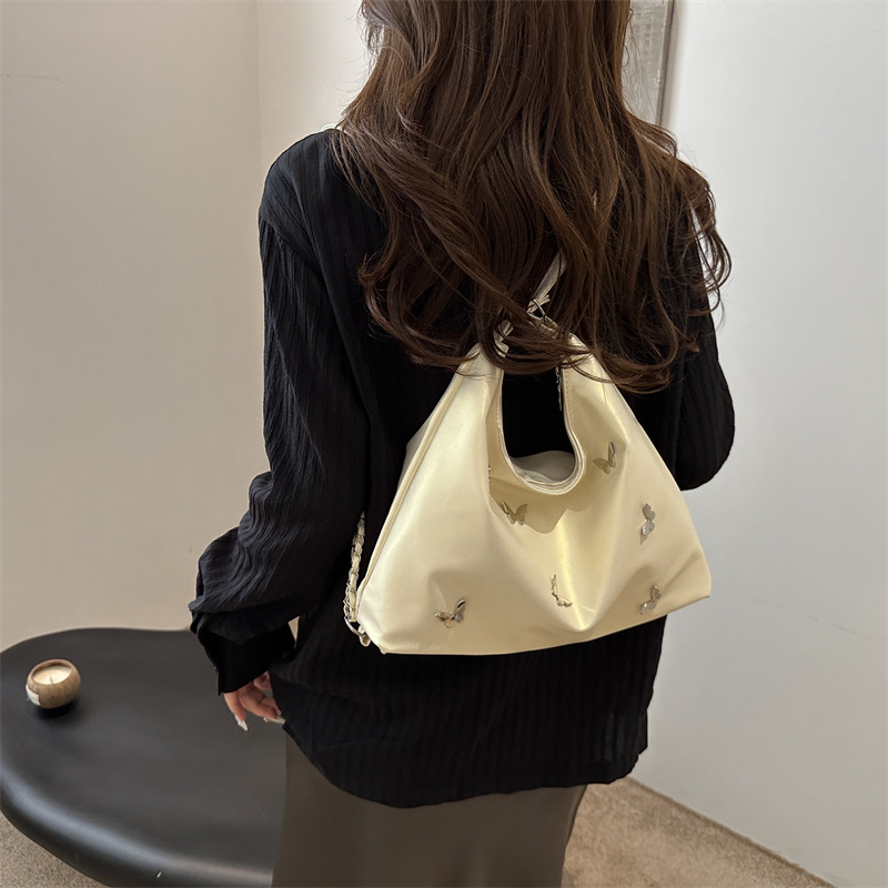Bolso de cadena de moda popular para mujeres 2024 verano nuevo bolso de hombro de gran capacidad nicho mariposa mochila de trabajo