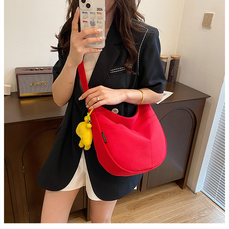 Simple solid-color canvas bag 2024 new style Japanese large-capacity single-shoulder dumpling bag, versatile for school and commuting crossbody bag undefined