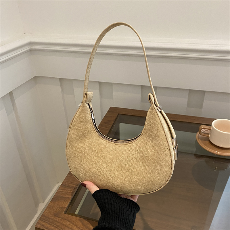 Bolsa de media luna francesa nicho para mujeres 2025 verano nuevo estilo de moda de color sólido esmerilado textura de moda bolso de hombro bolso debajo de la axila