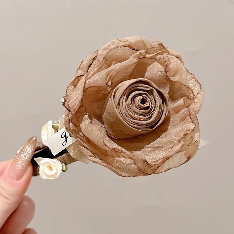 Temperamento flores clips de cabello femenino sensación de vacaciones en el mar detrás de la cabeza de alto nivel sensación de agarre clips de tiburón medio atado clips de cabeza