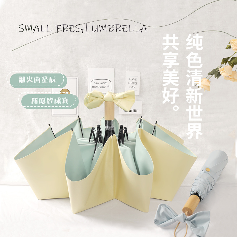 Umbrella sunshade umbrella Korean small fresh color glue three folding umbrella wooden handle advertising logo factory wholesale Umbrella sunshade umbrella Korean small fresh color glue three folding umbrella wooden handle advertising logo factory wholesale