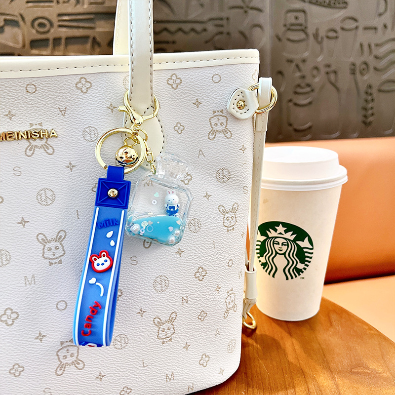 창조적 인 성격 배낭 자동차 펜던트 애호가 선물 도매 창조적 인 작은 흰색 토끼 키 체인 떠 다니는 창조적 인 오일