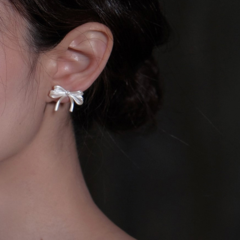 Matte retro fashionable trend elegant earrings with bow