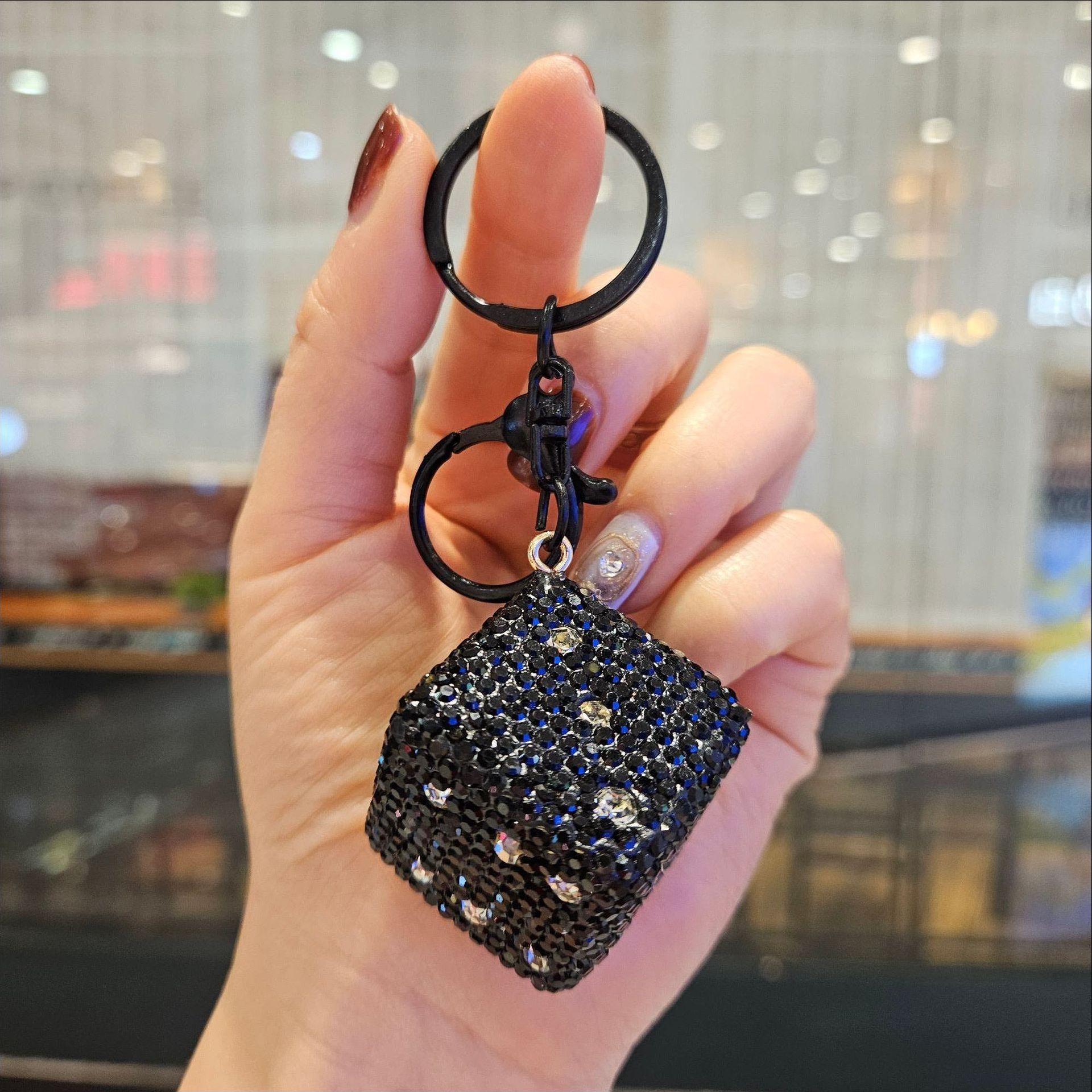 Diamond-encrusted dice—black