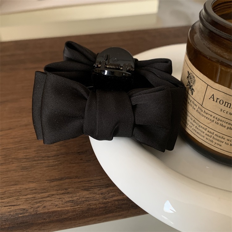 Small black double-sided bow 8cm