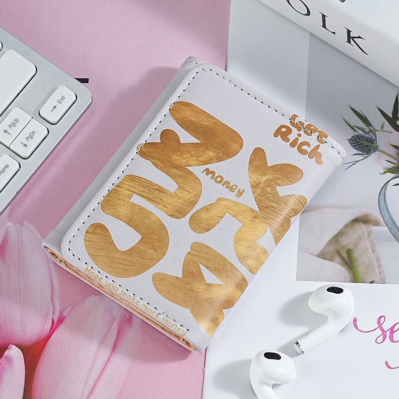 Bolsa de tarjetas de fortuna de Xiaoxian anti-damagnetismo tarjeta de conducir cubierta de tarjeta bancaria nueva bolsa de tarjetas de tres plegables patrón de impresión en stock