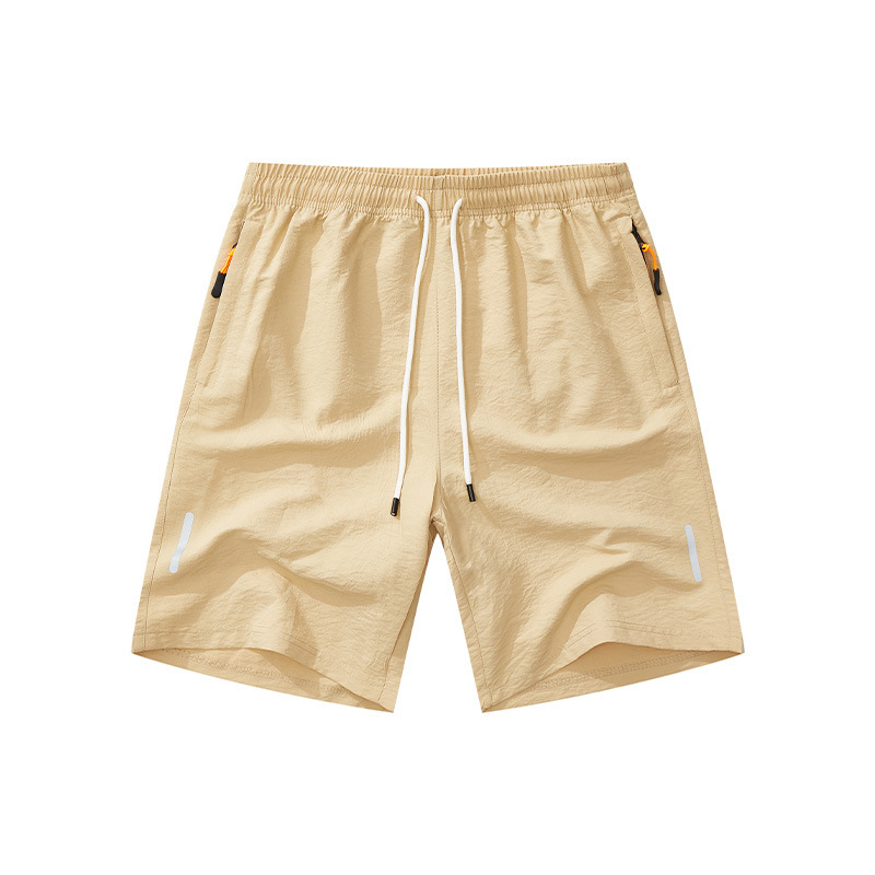 Hombres europeos y americanos Amazon deportes de ocio transfronterizos de secado rápido bolsillo corto tejido con cremallera pantalones tácticos de playa de moda callejera