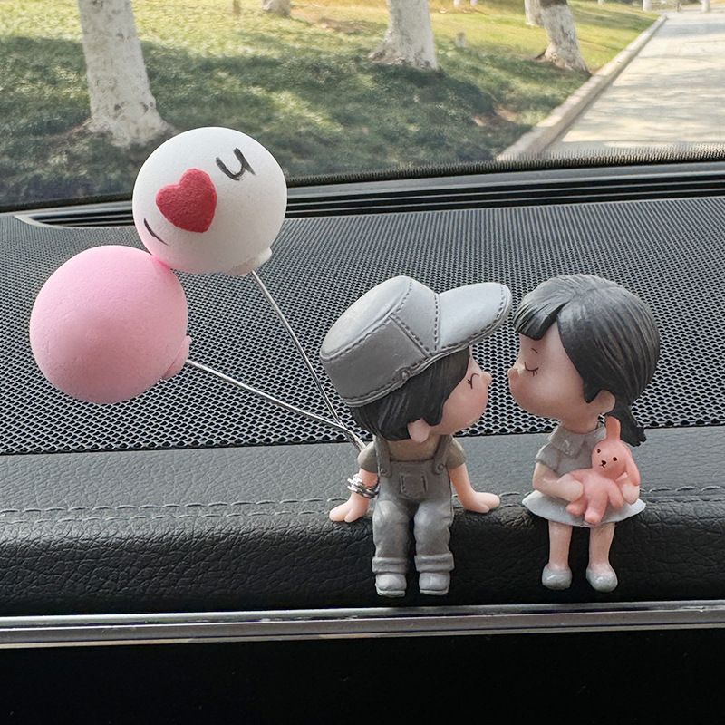 회색 인형 + 분홍색과 흰색 풍선