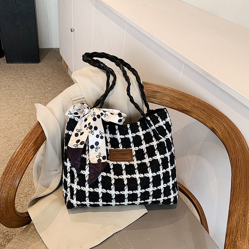 Bolsa de gran capacidad para mujeres 2025, nuevo tipo de bolso de hombro, bolso de compras de viaje, popular para mujeres.