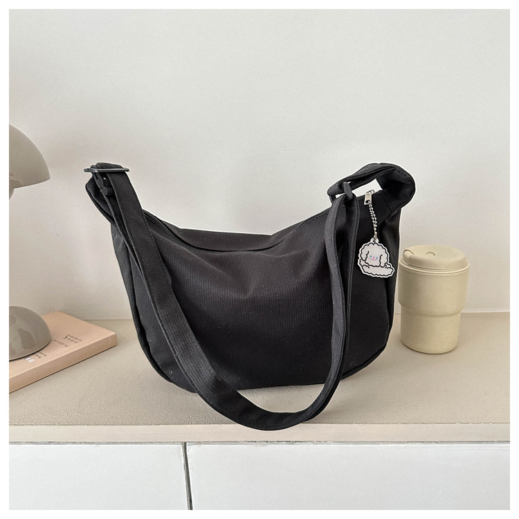 Large capacity canvas shoulder for women in spring summer 2023, new solid color, simple and fashionable casual bag,_voghion.com
