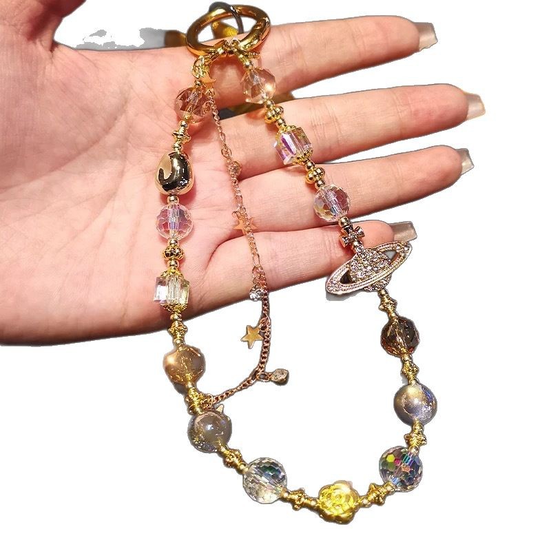 Cadenas de alta sensación de cuentas de cristal de Saturno parpadeante nuevo estilo chino bolso de cámara colgante corta cuerda de caso de teléfono móvil