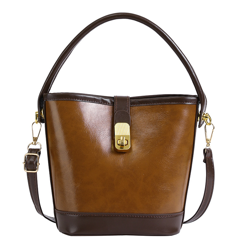 2024 New Women's Bag High End and Fashionable Handheld Bag Women's Retro and Simple Water Bucket Bag Small Cross Body Shoulder Bag_voghion.com