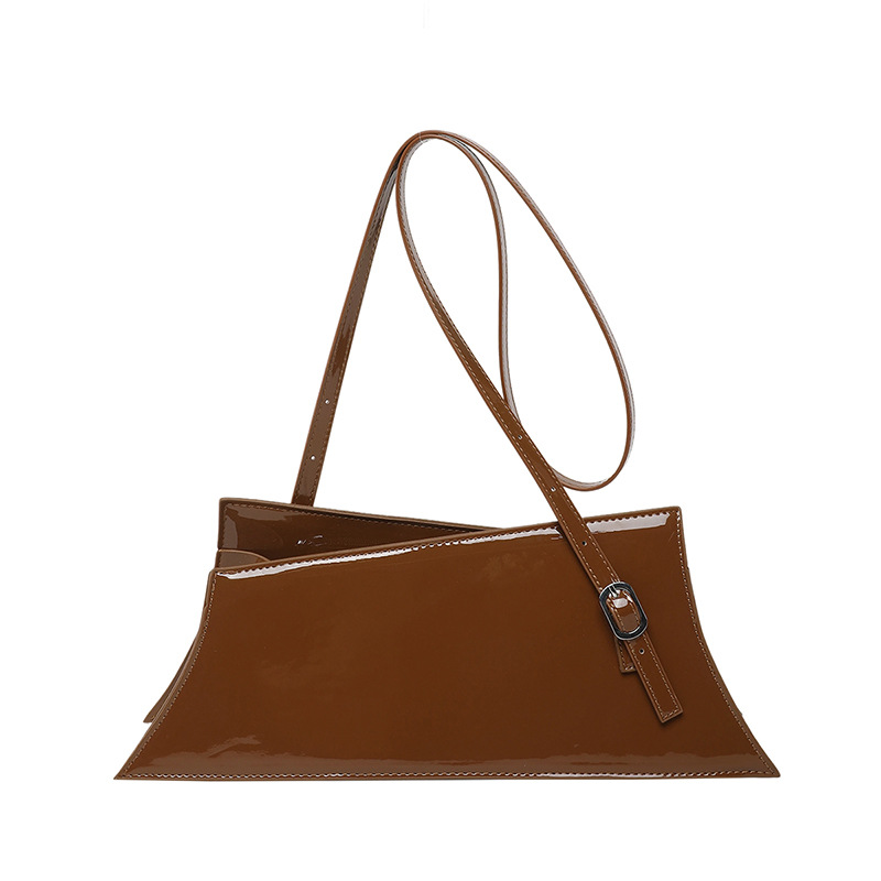 Bolso grande de diseño de nicho 2025 verano nuevo bolso femenino bolso de hombro de textura de alta gama charol brillante bolso de mensajero marea