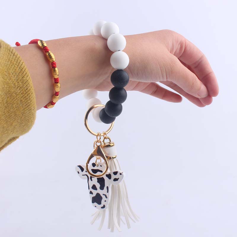 Korean Style Animal Wood Silica Gel Metal Beaded Unisex Keychain display picture 4