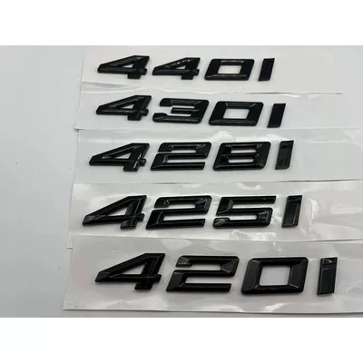 440i models; includes bright black — Car logo