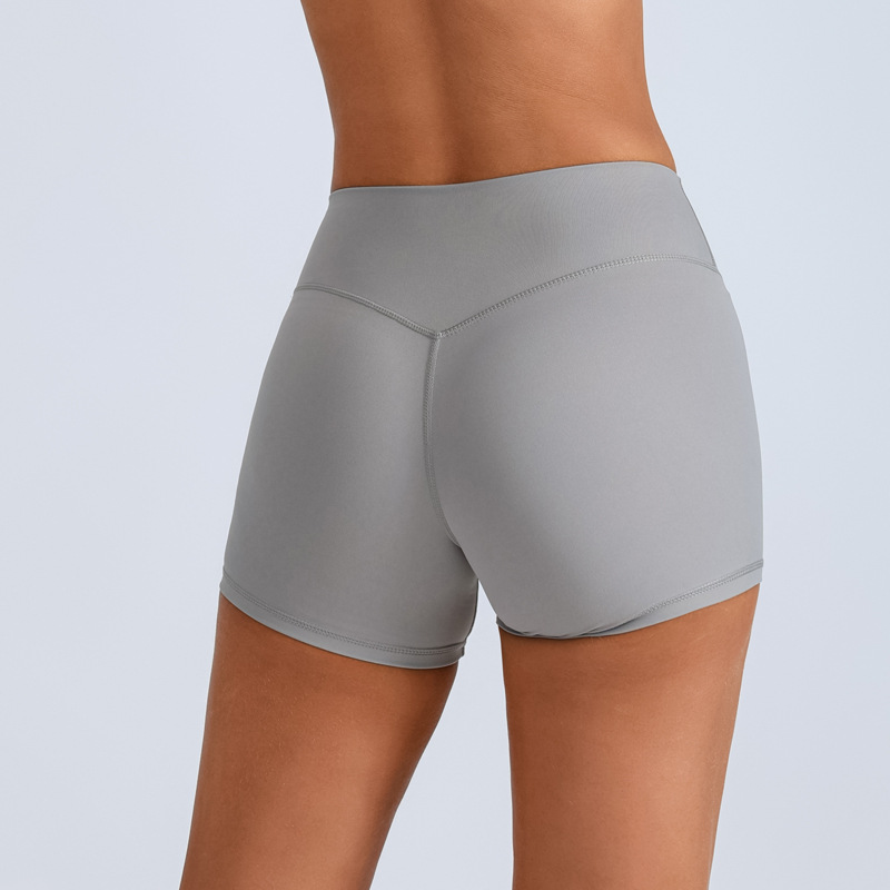 Traje de yoga europeo y americano transfronterizo, espalda hermosa con almohadilla para el pecho, sujetador con tirantes cruzados, pantalones deportivos de secado rápido de melocotón de cintura alta